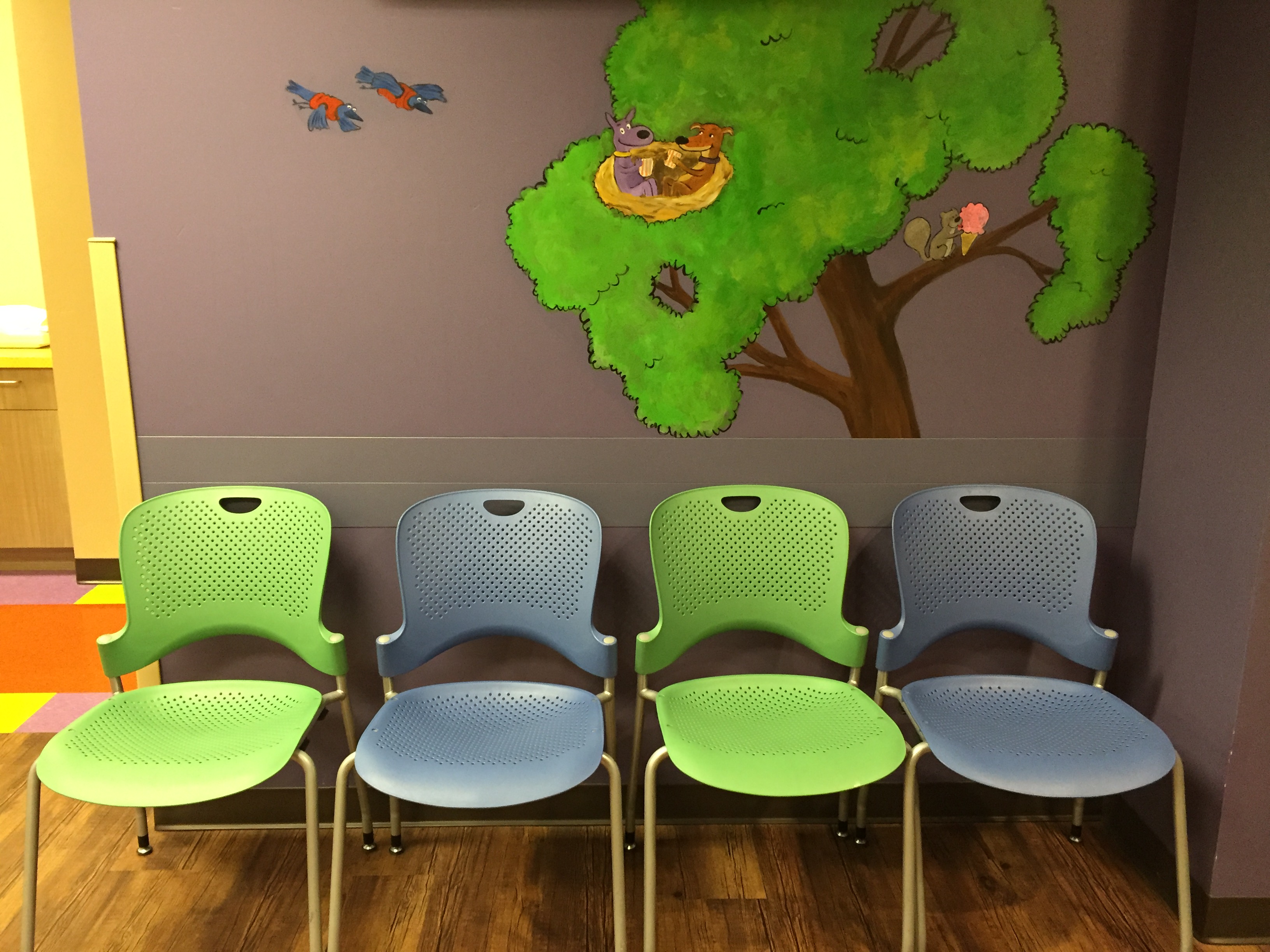 An image of the Bright Horizons Pediatrics colorful waiting room.